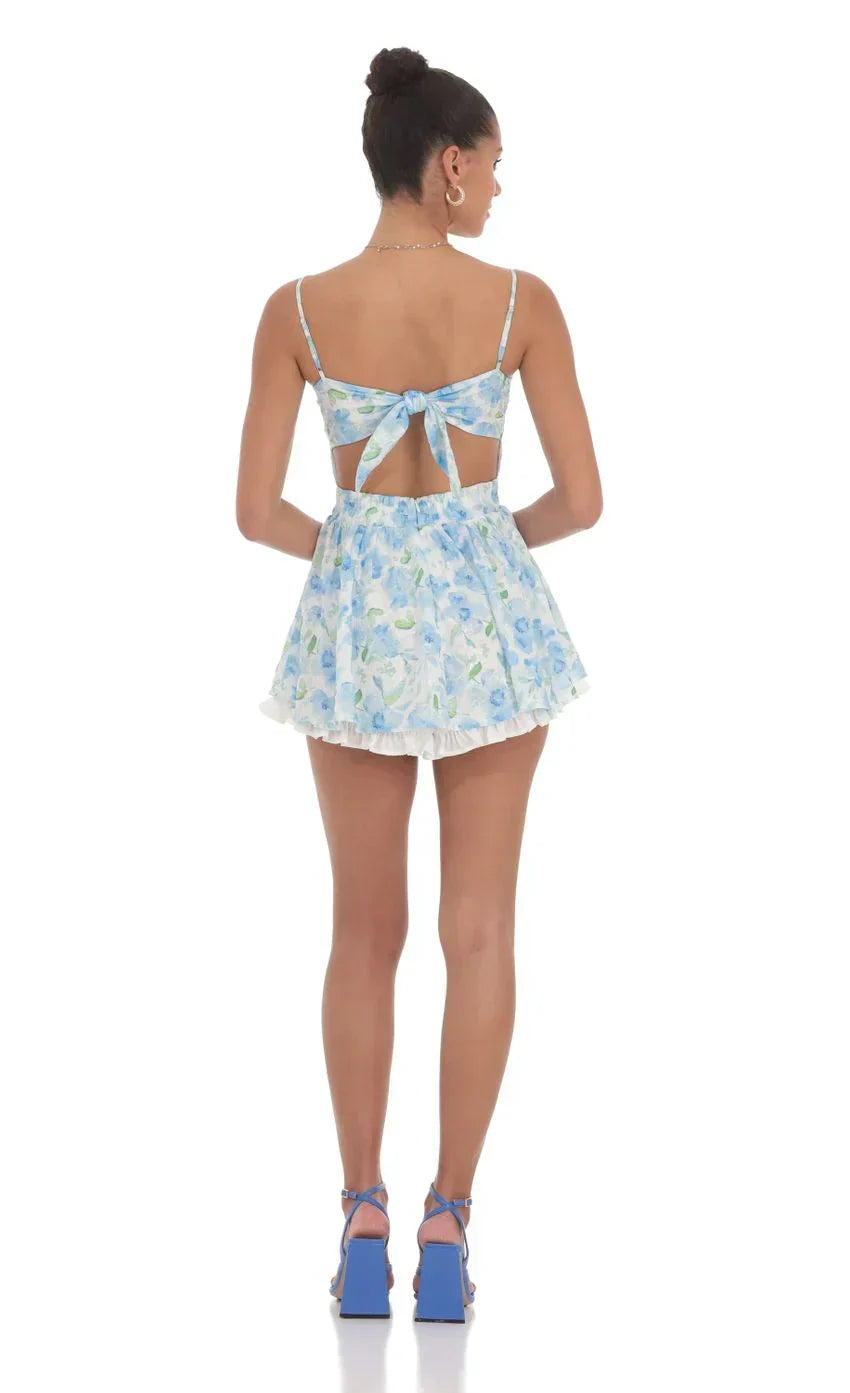 Blue Floral Ruffle Romper in White